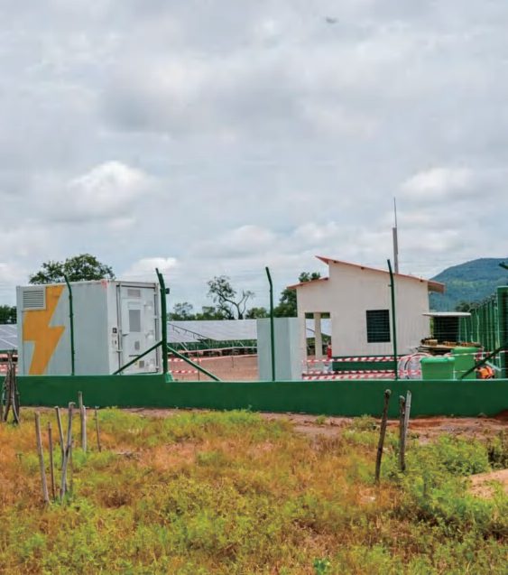 Telecom shelter in a green field